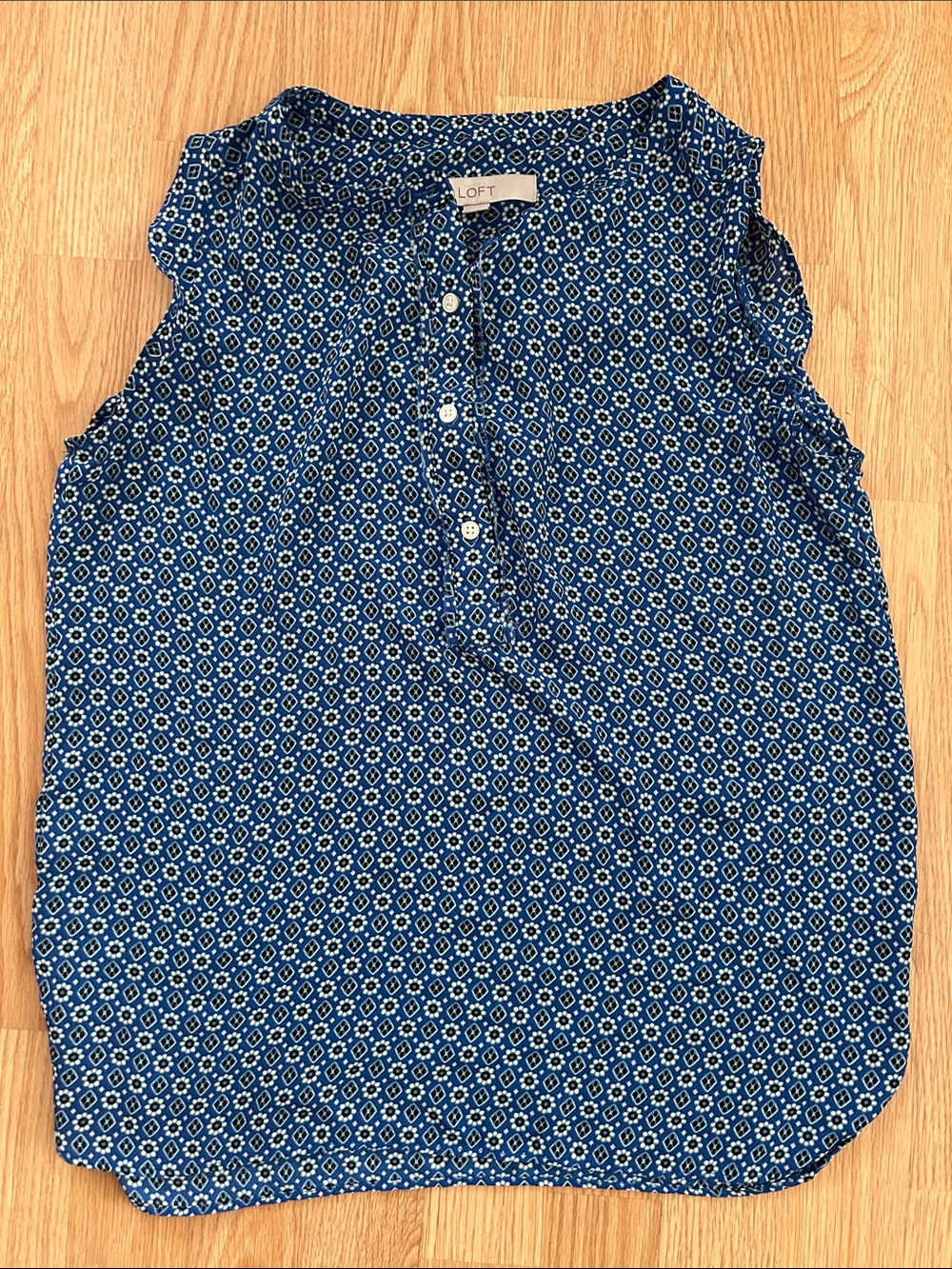 LOFT blue sleeveless henley blouse
